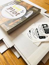 Load image into Gallery viewer, Lost the Plot allotment book and allotment guide being boxed ready for delivery
